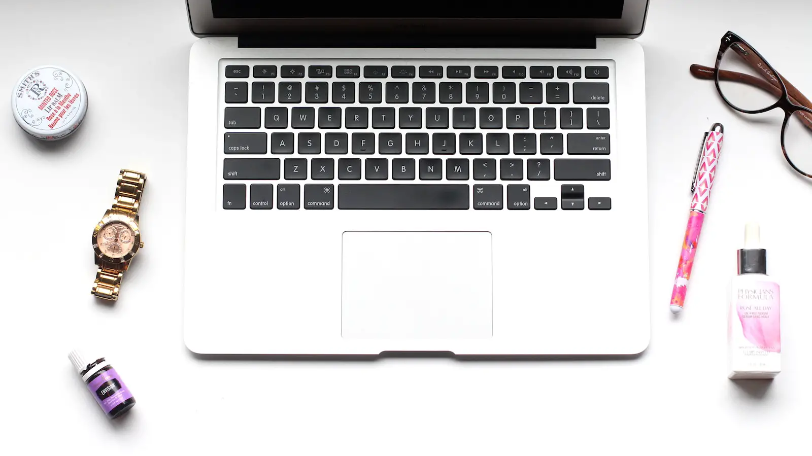 MacBook Pro near pen
